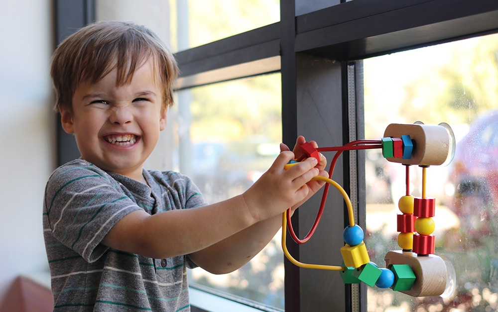 child playing at Child Watch