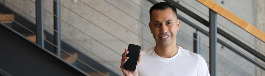 person with cellphone in hand