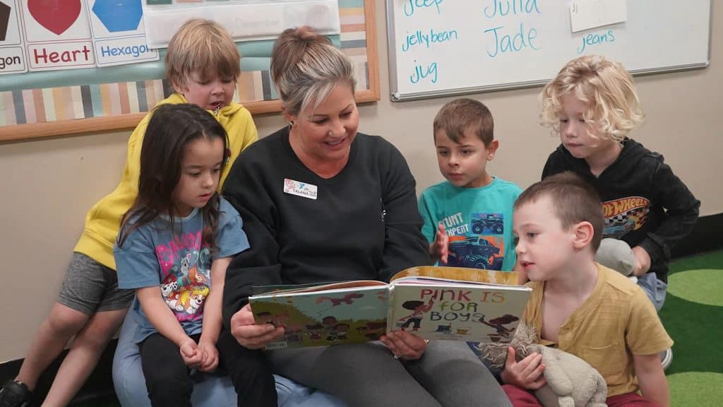 teacher reading to preschoolers