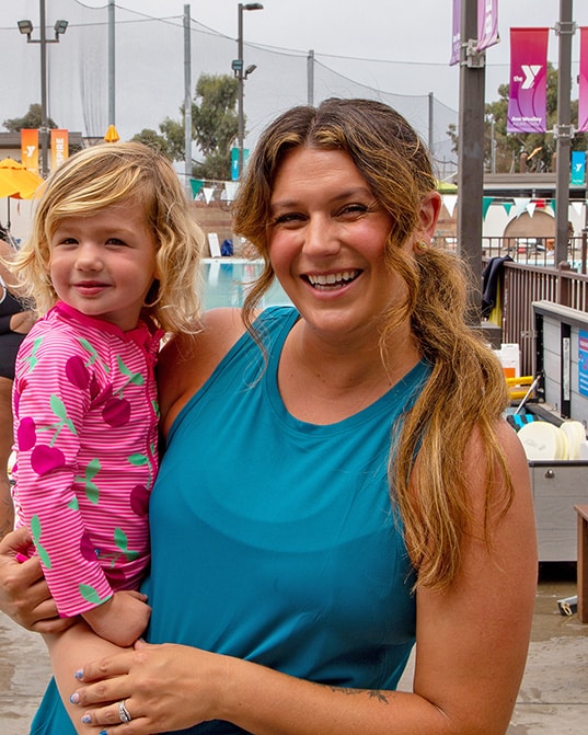 mom with child at the pool