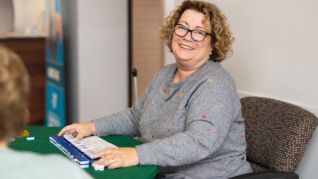 woman playing mahjong