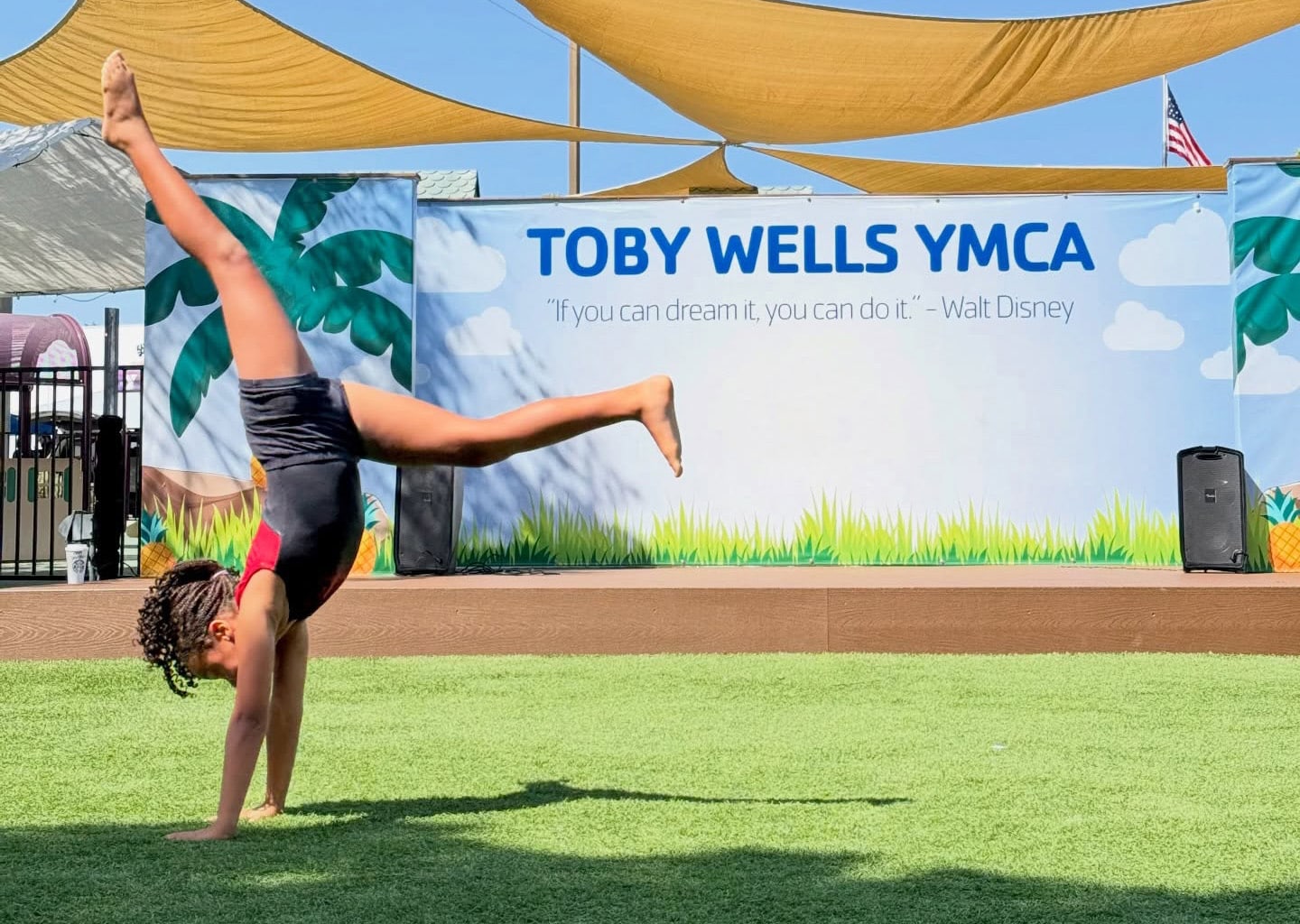 girl doing handstand at toby wells Y