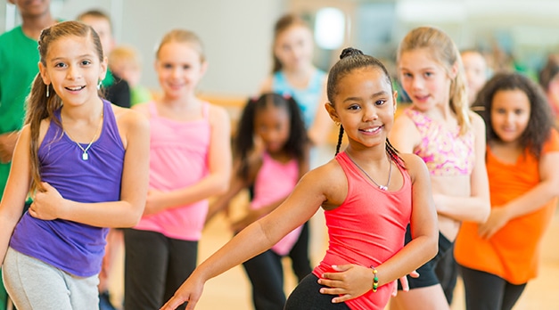 group of kids dancing in class